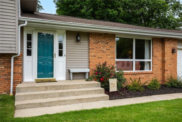 106 E Hawthorne Dr, Effingham, IL 62401 - view of exterior entry with brick siding