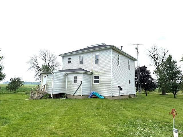 1953 E 4200 N Rd, Rankin, IL 60960 - back of house with a yard