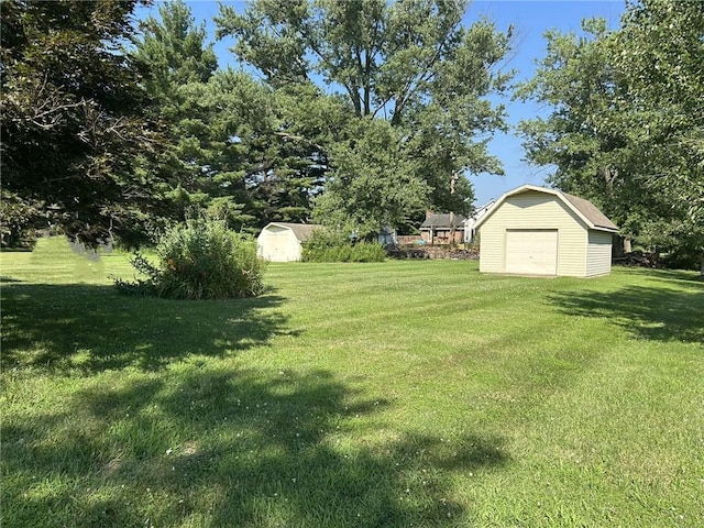 16142 Country Estates Rd, Effingham, IL 62401 - view of grassy yard with a storage shed