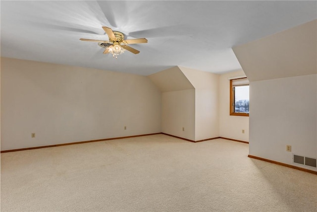16142 Country Estates Rd, Effingham, IL 62401 - bonus room with light colored carpet, vaulted ceiling, and a ceiling fan