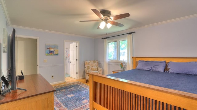 1950 Shore Oak Dr, Decatur, IL 62521 - bedroom featuring crown molding, a ceiling fan, and light wood-type flooring