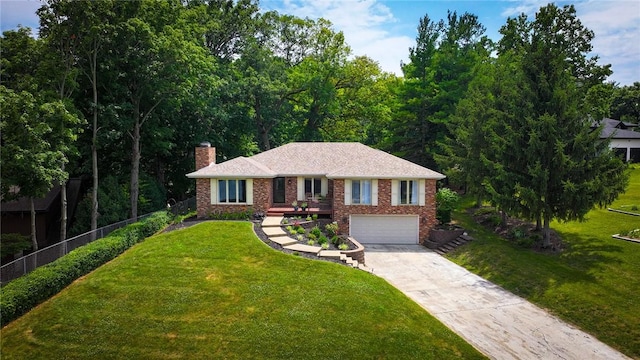 1950 Shore Oak Dr, Decatur, IL 62521 - ranch-style house featuring a chimney, brick siding, driveway, and a garage