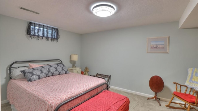1950 Shore Oak Dr, Decatur, IL 62521 - carpeted bedroom with baseboards and a textured ceiling