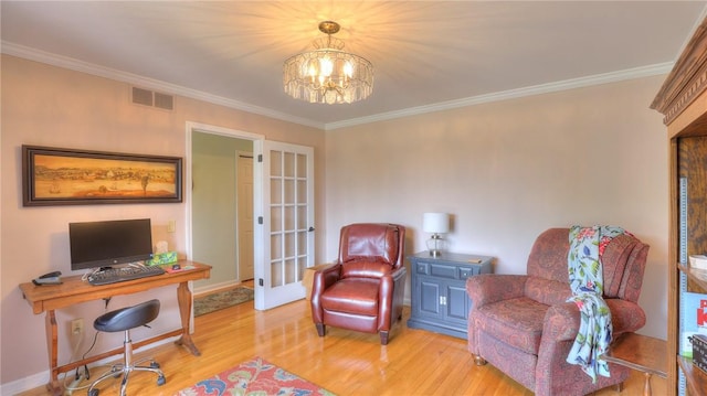 1950 Shore Oak Dr, Decatur, IL 62521 - sitting room with ornamental molding, a desk, a chandelier, wood finished floors, and french doors