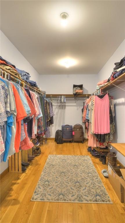 1950 Shore Oak Dr, Decatur, IL 62521 - walk in closet featuring wood finished floors