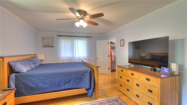 1950 Shore Oak Dr, Decatur, IL 62521 - bedroom with light wood-style floors, ornamental molding, and a ceiling fan