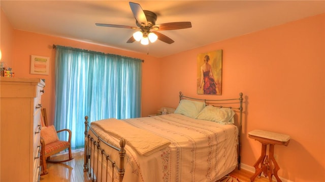 1950 Shore Oak Dr, Decatur, IL 62521 - bedroom with wood finished floors and a ceiling fan