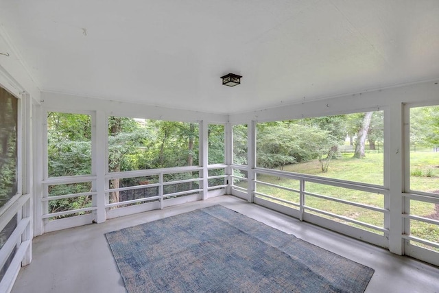 530 Powers Ln, Decatur, IL 62522 - unfurnished sunroom with concrete flooring