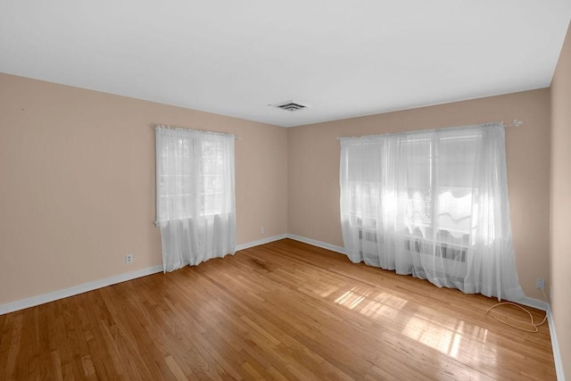 530 Powers Ln, Decatur, IL 62522 - empty room with wood finished floors