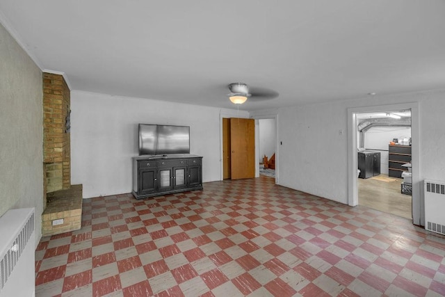 530 Powers Ln, Decatur, IL 62522 - unfurnished living room featuring tile patterned floors and radiator