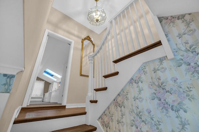 530 Powers Ln, Decatur, IL 62522 - staircase with a chandelier