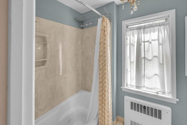 530 Powers Ln, Decatur, IL 62522 - bathroom with radiator and a combined bath / shower with jetted tub