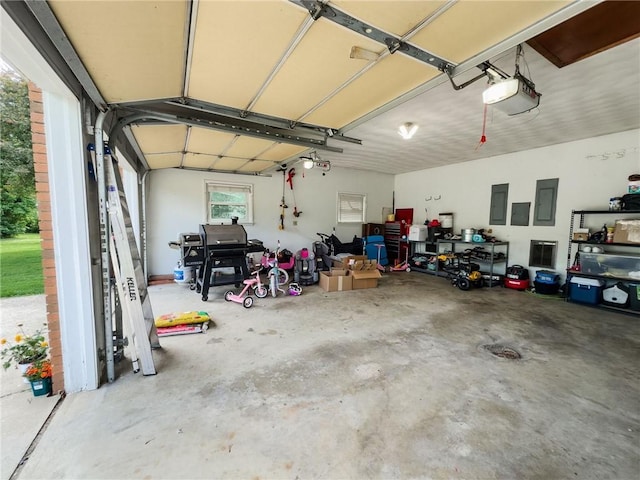 201 N York St, Martinsville, IL 62442 - garage featuring a garage door opener and electric panel