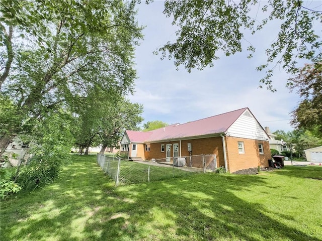201 N York St, Martinsville, IL 62442 - rear view of property with brick siding and metal roof