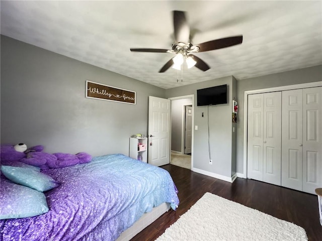 201 N York St, Martinsville, IL 62442 - bedroom with wood finished floors, a closet, baseboards, and a ceiling fan