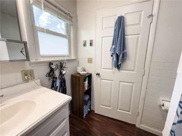 201 N York St, Martinsville, IL 62442 - bathroom with tile walls, wood finished floors, and vanity