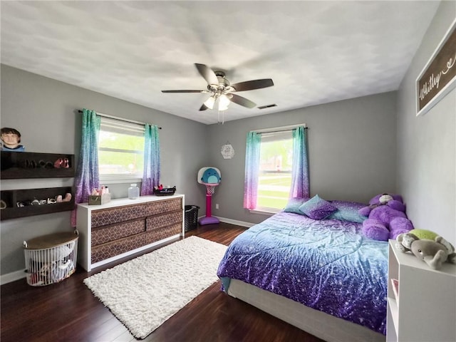 201 N York St, Martinsville, IL 62442 - bedroom with wood finished floors, ceiling fan, and baseboards