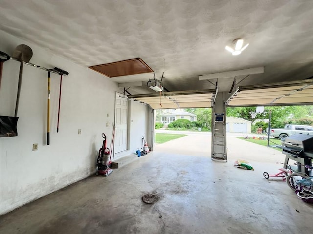 201 N York St, Martinsville, IL 62442 - garage featuring a garage door opener