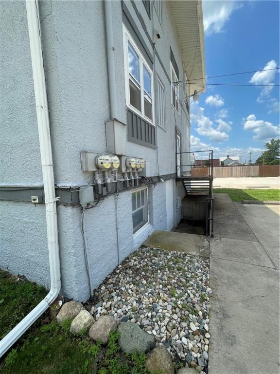 428 E Main St, Hoopeston, IL 60942 - view of property exterior featuring stucco siding