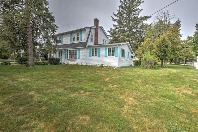 view of front of house with a front lawn