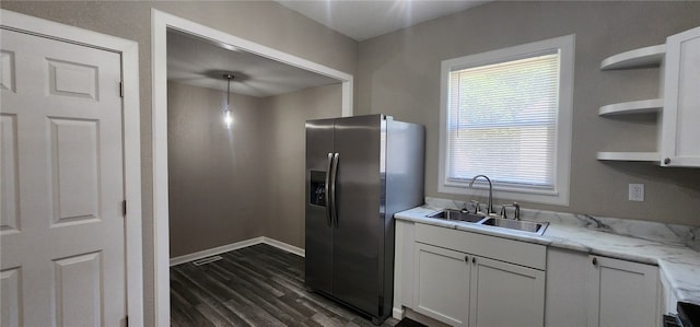 1420 E Main St, Decatur, IL 62521 - kitchen featuring stainless steel fridge, open shelves, dark wood-style floors, white cabinetry, and light stone counters