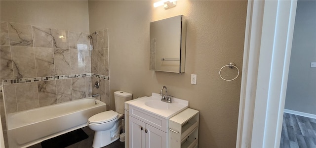 1420 E Main St, Decatur, IL 62521 - full bathroom with vanity,  shower combination, and wood finished floors