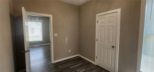 1420 E Main St, Decatur, IL 62521 - empty room with dark wood-style flooring and baseboards