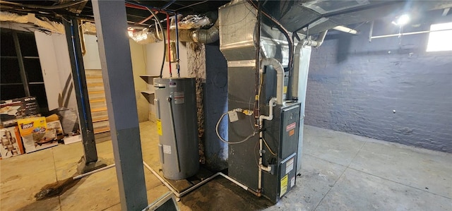 1420 E Main St, Decatur, IL 62521 - utility room featuring electric water heater