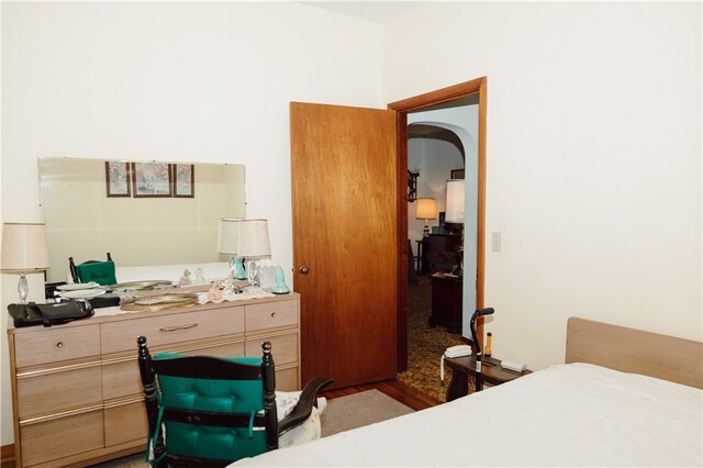 bedroom with wood-type flooring