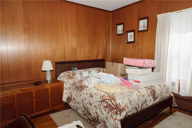 125 College St, Assumption, IL 62510 - bedroom with wood walls and wood finished floors