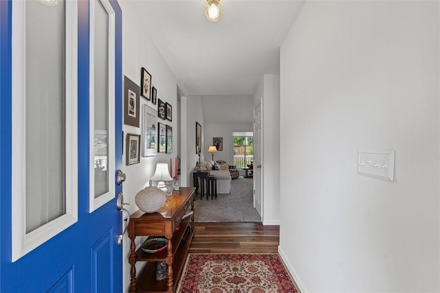 2506 Woodlawn Dr, Charleston, IL 61920 - foyer entrance featuring dark wood finished floors and baseboards