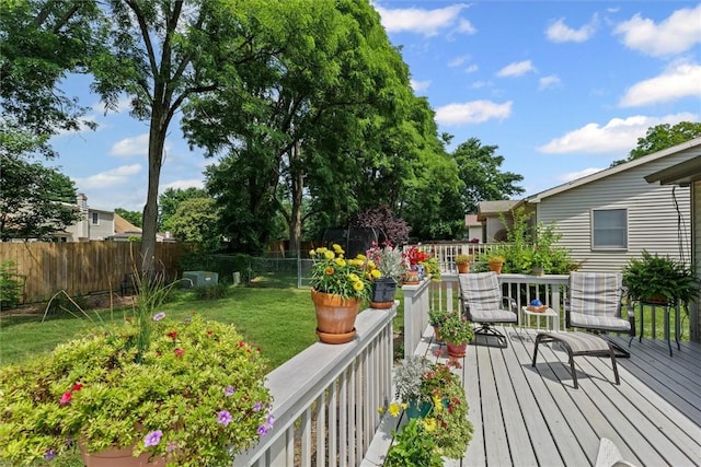 2506 Woodlawn Dr, Charleston, IL 61920 - wooden deck with a fenced backyard
