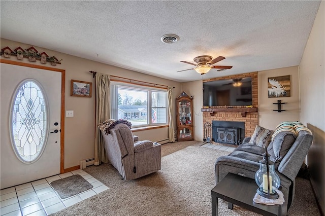 carpeted living area featuring a textured ceiling, a baseboard radiator, tile patterned flooring, and visible vents