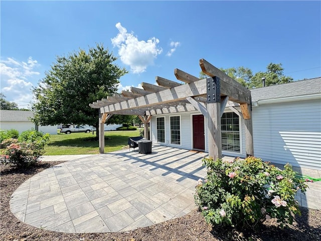 202 Seminary St, Catlin, IL 61817 - rear view of property featuring a pergola, a patio area, and a lawn