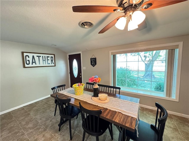 202 Seminary St, Catlin, IL 61817 - tiled dining room with ceiling fan and a textured ceiling