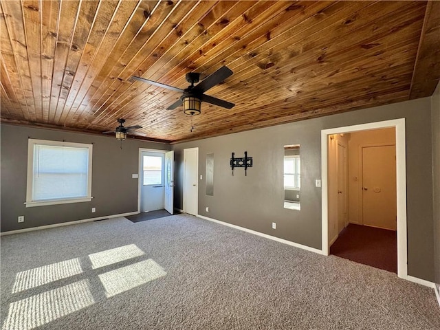 1821 Dakota Ave, Mattoon, IL 61938 - carpeted empty room featuring wooden ceiling, ceiling fan, and baseboards