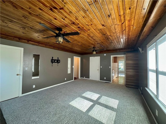 1821 Dakota Ave, Mattoon, IL 61938 - carpeted empty room with a ceiling fan, baseboards, and wooden ceiling