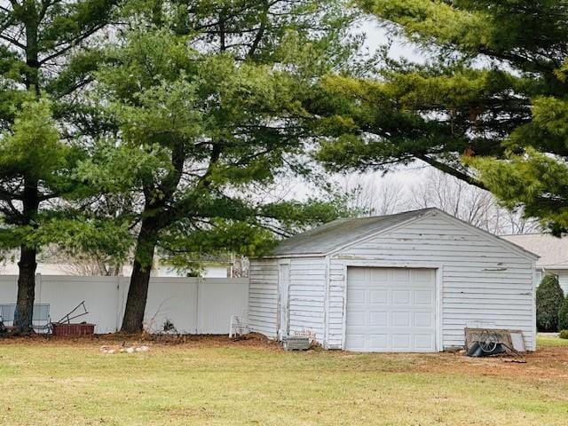 garage with a lawn