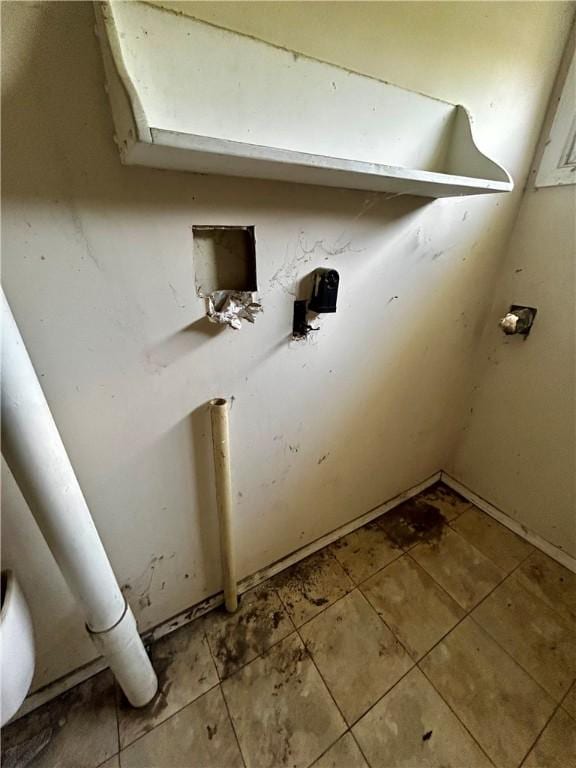 305 Bensyl Ave, Danville, IL 61832 - laundry room featuring tile patterned flooring