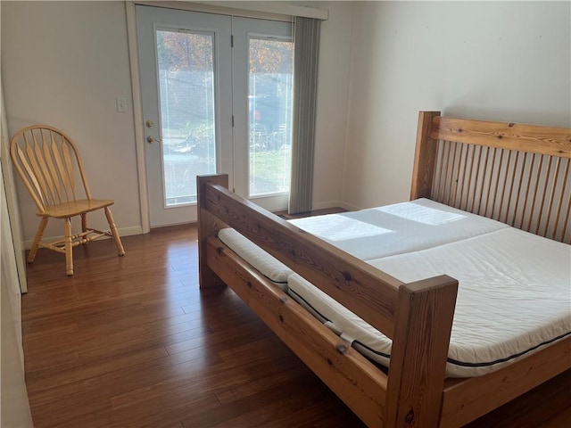 bedroom featuring dark wood-type flooring