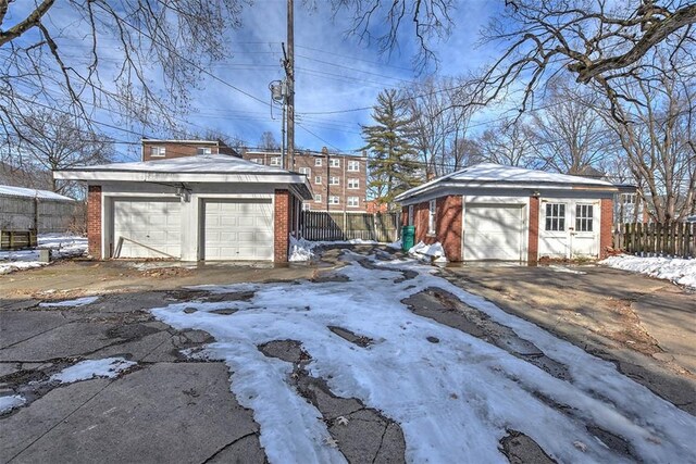 view of snow covered garage