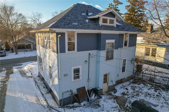 view of snow covered property