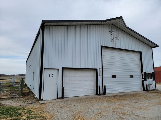 detached garage with fence