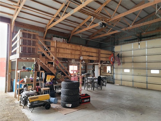 garage with metal wall and a garage door opener