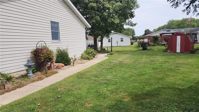 1006 N Koester Dr, Effingham, IL 62401 - view of grassy yard with a shed and an outdoor structure