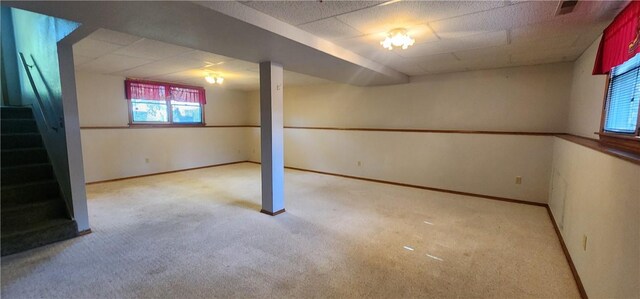1006 N Koester Dr, Effingham, IL 62401 - below grade area featuring carpet, stairway, baseboards, and a drop ceiling