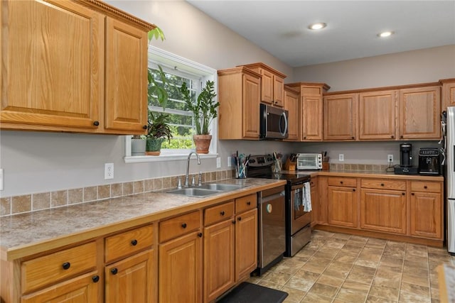 485 County Road 600 N, Neoga, IL 62447 - kitchen featuring appliances with stainless steel finishes, light countertops, recessed lighting, and brown cabinets