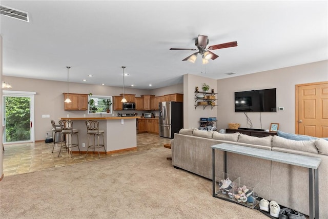 485 County Road 600 N, Neoga, IL 62447 - living area featuring ceiling fan, light colored carpet, and recessed lighting