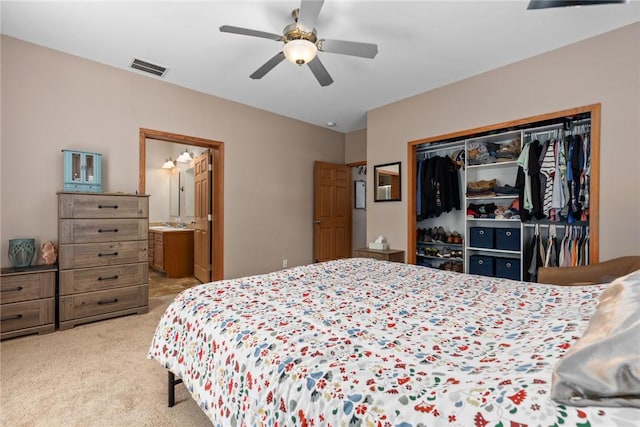 485 County Road 600 N, Neoga, IL 62447 - bedroom featuring a closet, carpet, a ceiling fan, and ensuite bathroom
