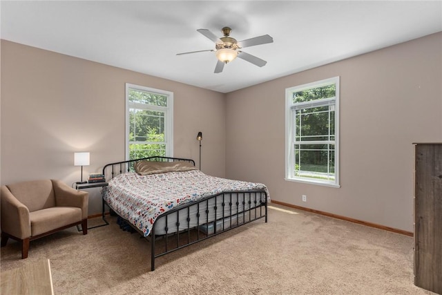 485 County Road 600 N, Neoga, IL 62447 - carpeted bedroom with multiple windows and a ceiling fan